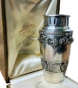 A French Racine Marseille silver tapering cylindrical vase, embossed with floral swags, banded
