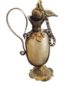 A 19th century French gilt metal and mother-of-pearl novelty scent bottle, in the form of a ewer,