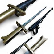 A Pritchard-Greener style revolver-bayonet, 8½in  T-section blade, brass one-piece grip with cross