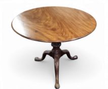A 19th century mahogany occasional table, the circualr top tilting on cylindrical column, with lobed