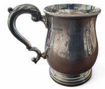 A silver baluster shaped tankard, scroll handle, engraved J.C.H. - J.B.I. 1952 -> 1964 -> 1994?,