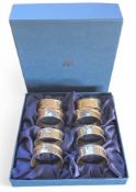 A set of six silver contemporary serviette rings, W I Broadway & Co, Birmingham, 2005, boxed; 97.g