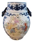 A  Chinese Republic period pear shaped vase, decorated with children playing on a tree branch, the