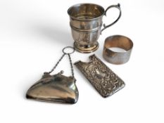 An Edwardian silver calling card case, embossed in relief with foliate and scrolls, vacant