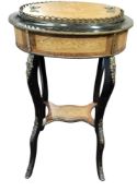 A 19th century French ebonised gilt metal mounted and marquetry oval jardiniere table, pierced