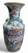 A Chinese famille rose vase, decorated with gods, figures, animals and buildings, in coloured