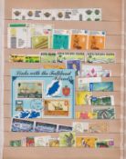 Stamps- A GB, Commonwealth and World mint and used stamps in a Stock book. Includes GB from 1880