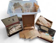 Stamps- A large accumulation of World mainly used stamps in boxes, envelopes, and loose plus