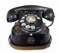 A Belgian black and gilt brass mounted telephone, monogramed  TTR,  marked Belgique Bell Telephone