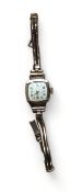 A 9ct gold Avia lady's wristwatch, 17 jewel movement, silver coloured dial, Arabic and baton