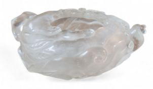 A Chinese 'rock crystal' style scholar's brush washer, carved with qilong, lingzhi and a bat, 15cm