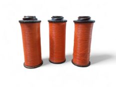 Three unusual large bakelite spools, each with screw tops and wrapped with orange nylon fishing