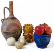 An onyx apple paperweight, 9.5cm high;  another, smaller;  a pear;   an Italian lion;   dried