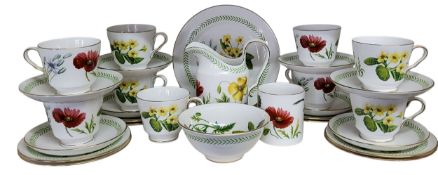 A Spode Country Lane pattern tea service, for eight,  comprising  teacups, saucers and side