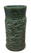 A Chinese green spinach jade cylindrical brush pot or Bitong,  the collar carved with cloud, above