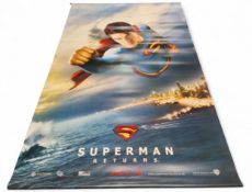 A signed Superman Returns large format cinema foyer PVC hanging banner, signed in black pen by