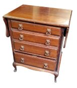 An early 20th century mahogany desk, rectangular top with serpentine fall leaves, frieze drawer with