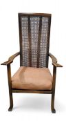 A Lloyd Loom style wicker  chair, c.1940;  an early 20th century mahogany slender arched easel