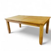 An contemporary oak rectangular extending dining table, 80cm high,  283cm wide extended, 182cm
