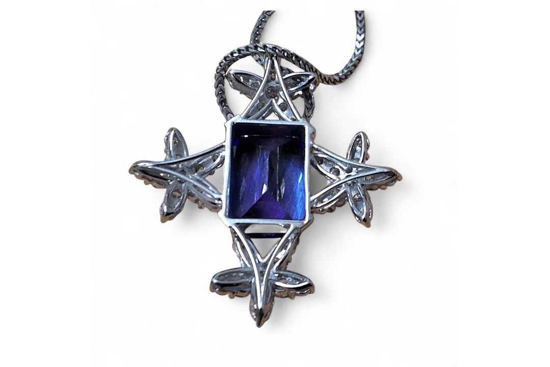 A privately commissioned white metal, tanzanite and diamond pendant, the centrally set emerald cut - Image 2 of 2