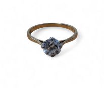 An 18ct gold diamond solitaire ring, four claw set  old European cut round diamond, colour G/H,