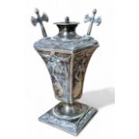 A Victorian silver wax jack, of tapering square form, embossed with Minerva and foliate, two