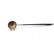 A George III silver toddy ladle,  the bowl embossed  and centred with a coin, wrythen horn handle,