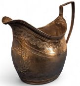 A George III silver boat shaped cream jug, bright-cut engraved with laurel cartouche, scrolling