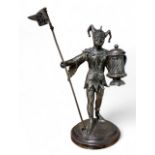 A Victorian silver novelty table figural condiment, as a jester, holding a tankard, standing by a
