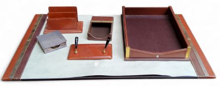 A Cross Italy desk set, comprising blotter, letter rack, pen holder, desk tidy tray, the blotter