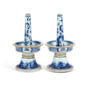 A PAIR OF CHINESE BLUE AND WHITE PORCELAIN ALTAR STICKS 18TH CENTURY