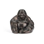 A CHINESE PORCELAIN FAUX BRONZE BUDDHA