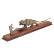 A 19TH CENTURY ANGLO-INDIAN CARVED RHINOCEROS HORN MODEL OF A TIGER AND A SNAKE