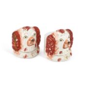 A PAIR OF VICTORIAN STAFFORDSHIRE POTTERY SASH WINDOW STOPS CIRCA 1860