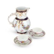 TWO 18TH CENTURY GERMAN PORCELAIN CUPS AND SAUCERS