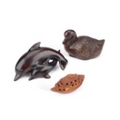 TWO JAPANESE CARVED WOOD NETSUKES AND A JAPANESE OJIME BEAD
