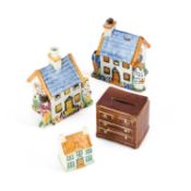 A GROUP OF FOUR 19TH CENTURY POTTERY MONEY BOXES