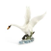A HUTSCHENREUTHER PORCELAIN MODEL OF A SWAN