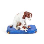 A COPELAND & GARRETT PORCELAIN MODEL OF A SPANIEL AND PUPPIES CIRCA 1850