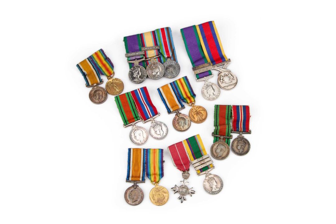 A COLLECTION OF MOUNTED MINIATURE MEDAL GROUPS