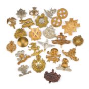 A COLLECTION OF CAP BADGES
