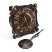 AN ARTS AND CRAFTS COPPER WALL CLOCK