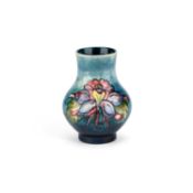 A SMALL WALTER MOORCROFT POTTERY VASE