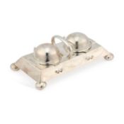 AN EDWARDIAN SILVER-PLATED INKSTAND