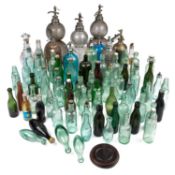 A LARGE COLLECTION OF SODA SYPHONS AND BOTTLES