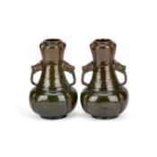 CLÉMENT MASSIER (FRENCH, 1844-1917) A PAIR OF TWO-HANDLED STONEWARE VASES