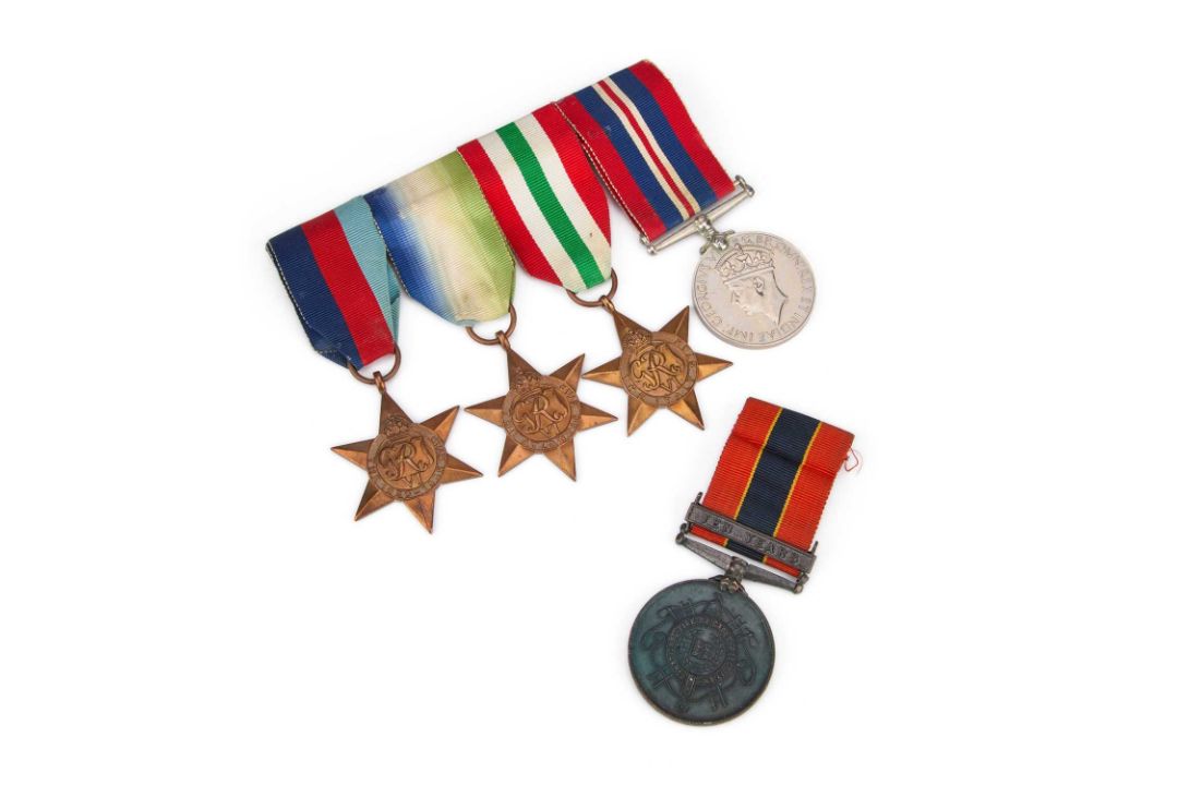 A SECOND WORLD WAR MOUNTED GROUP AND A FIRE BRIGADE LONG SERVICE MEDAL