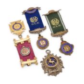 THREE FRATERNAL SILVER AND ENAMEL MEDALS AND A LAPEL BADGE