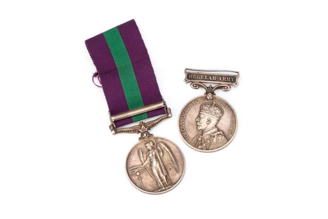 A GEORGE V REGULAR ARMY MEDAL AND A GEORGE IV GENERAL SERVICE MEDAL (G.S.M.) WITH PALESTINE CLASP