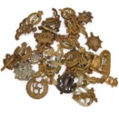 A GROUP OF MILITARY CAP BADGES